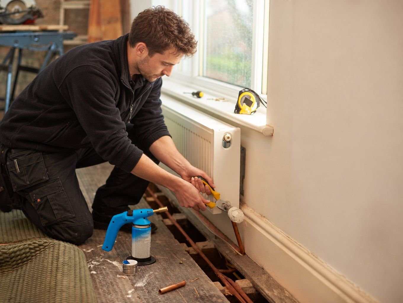 Newly installed consumer unit with the cover lifted for checking
