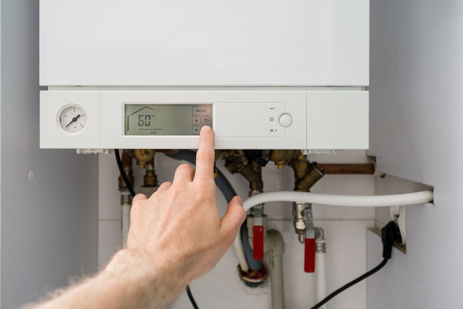 Adjusting the controls on a combi boiler