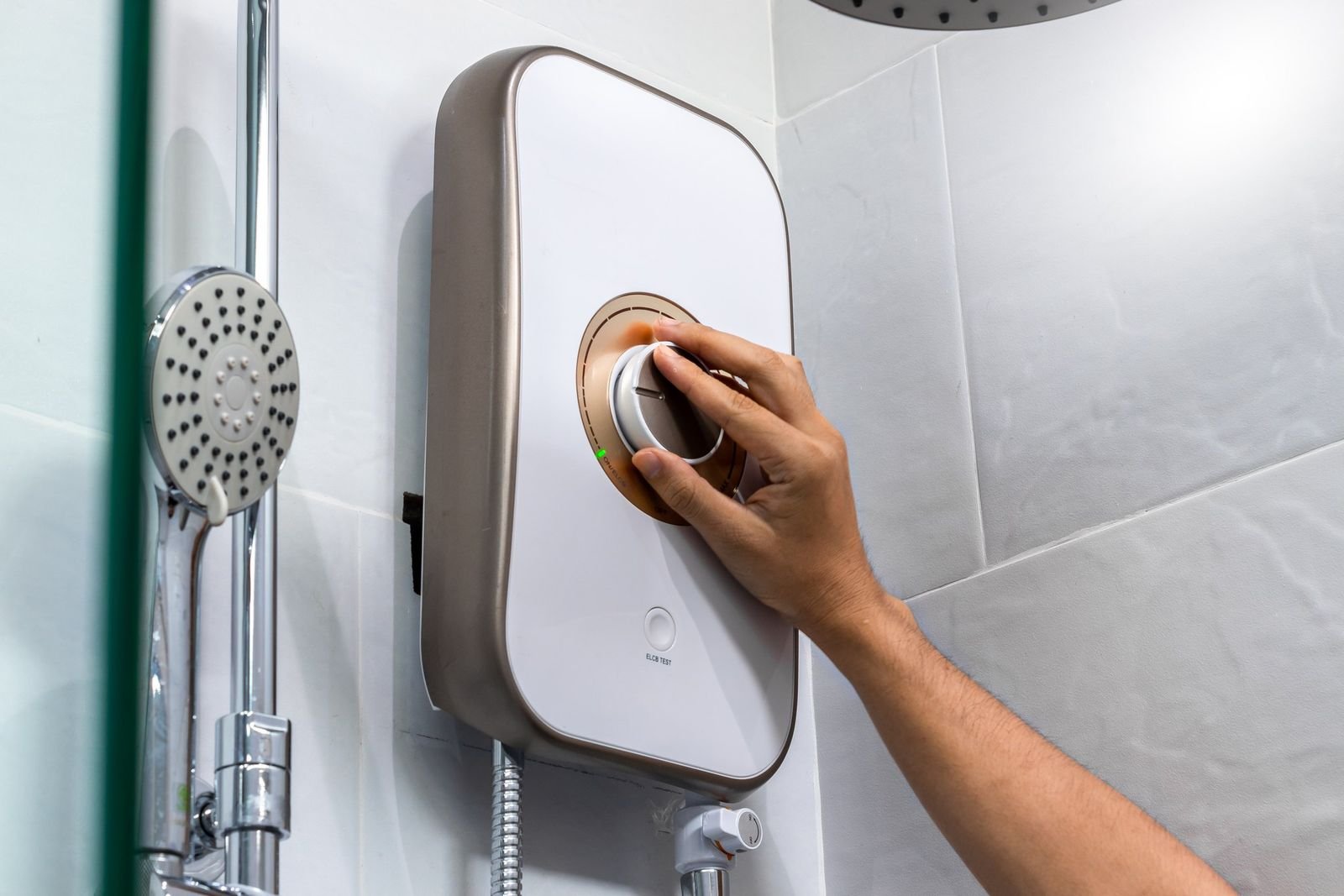 Fast Fix plumber using a wrench on pipework under a basin